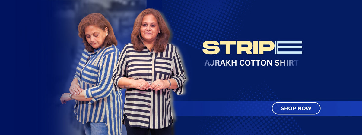 Two women modeling striped cotton shirts against a dark blue promotional background with the text 'STRIPES AJRAKH COTTON SHIRT' and a 'SHOP NOW' button.
